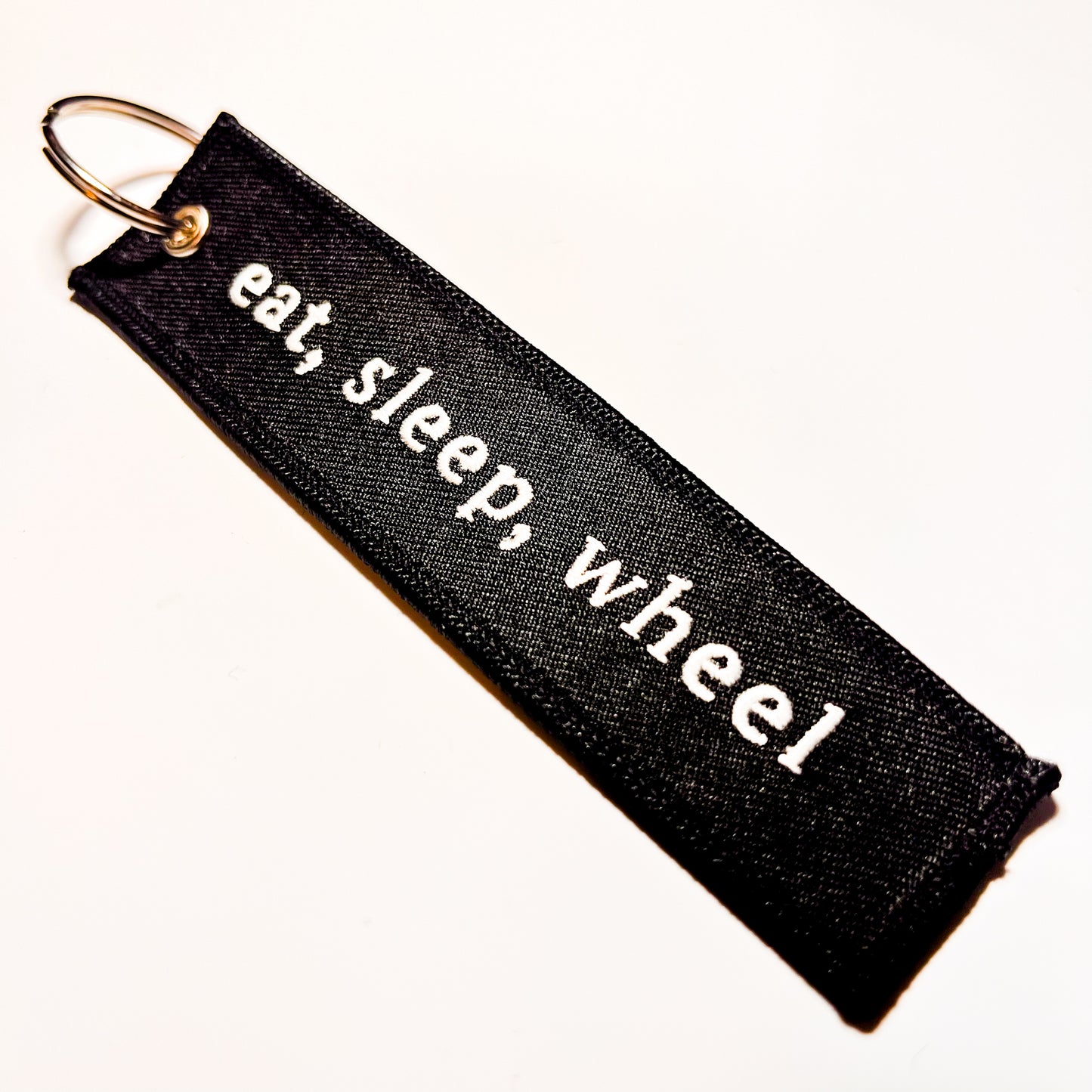 "Eat, Sleep, Wheel" Flight Tag