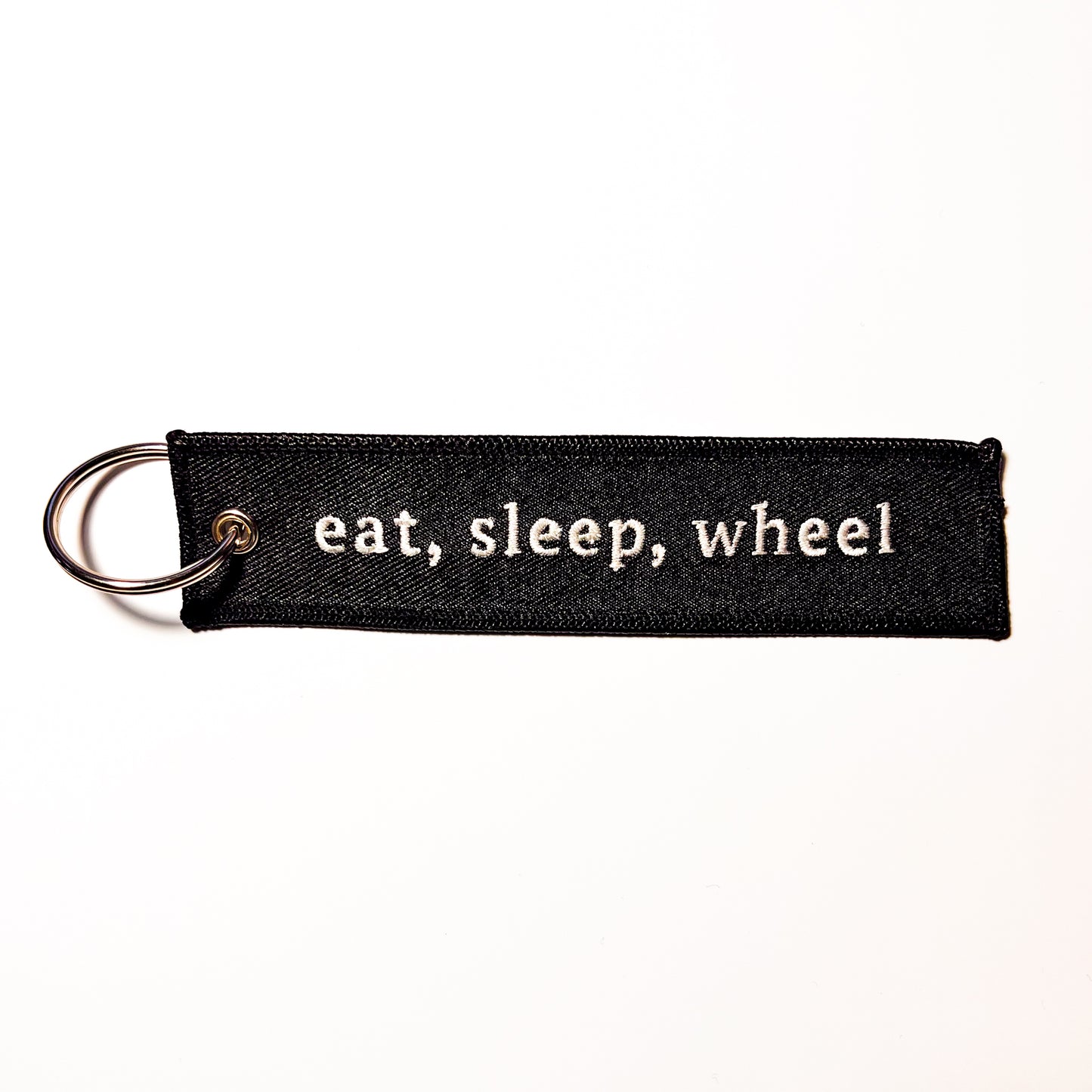 "Eat, Sleep, Wheel" Flight Tag