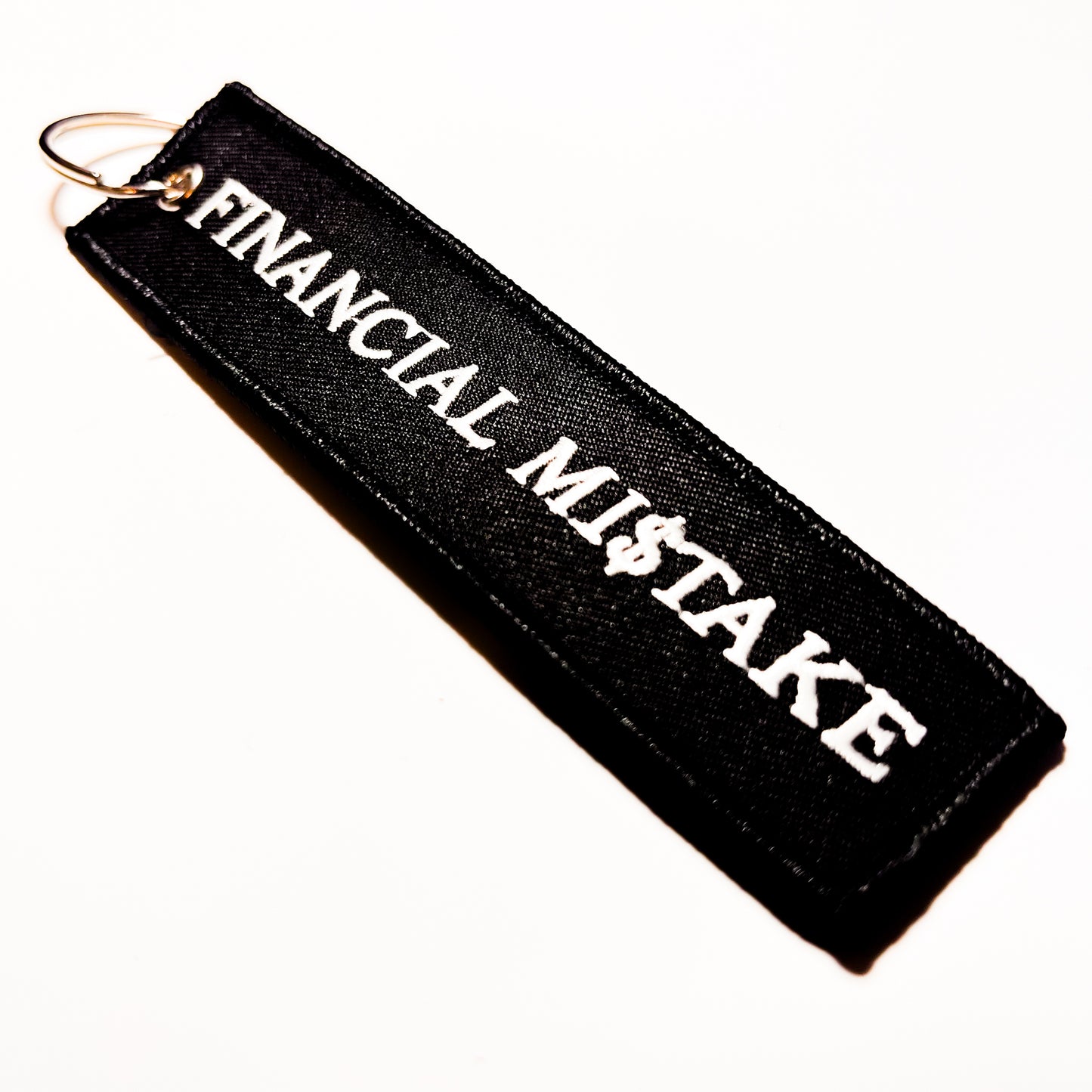 "Financial Mi$take' Flight Tag