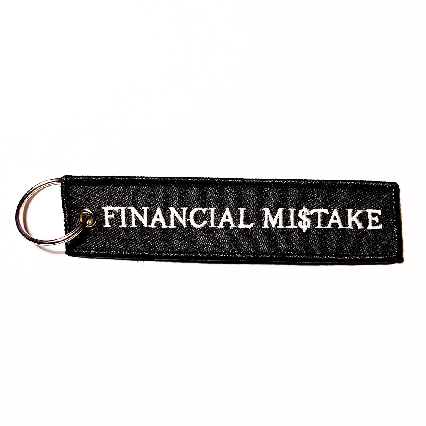 "Financial Mi$take' Flight Tag